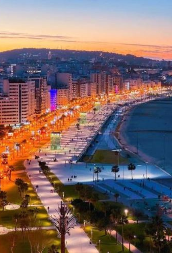 Luxury Airport Transfer Marrakech - The Ultimate 2026 VIP Guide Panoramic view of Tangier city, showcasing its beautiful coastline, historic architecture, and bustling medina, highlighting the vibrant cultural and economic hub of northern Morocco.