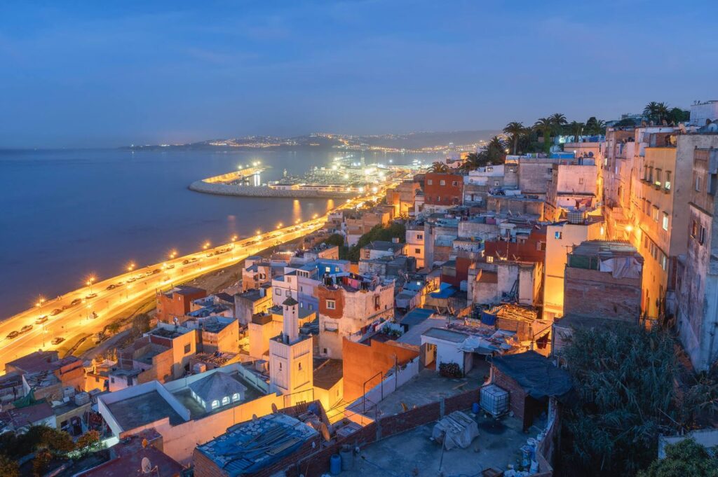 Things to Do in Morocco: The Ultimate Luxury Travel Guide Scenic view of Tangier city, Morocco, with its vibrant Medina, bustling port, and stunning coastline along the Strait of Gibraltar.