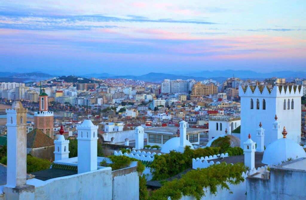 Discover the Enchantment of Tangier: The Gateway to Africa Scenic view of Tangier city, Morocco, with its vibrant Medina, bustling port, and stunning coastline along the Strait of Gibraltar.