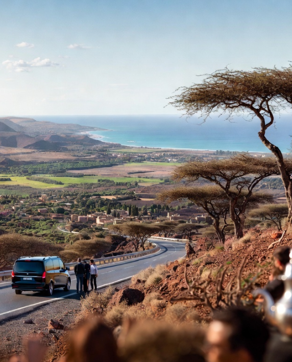 Luxury Mercedes V-Class driving through scenic Moroccan landscapes from Marrakech to Essaouira